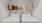a white washing machine and a shelf with baskets on it