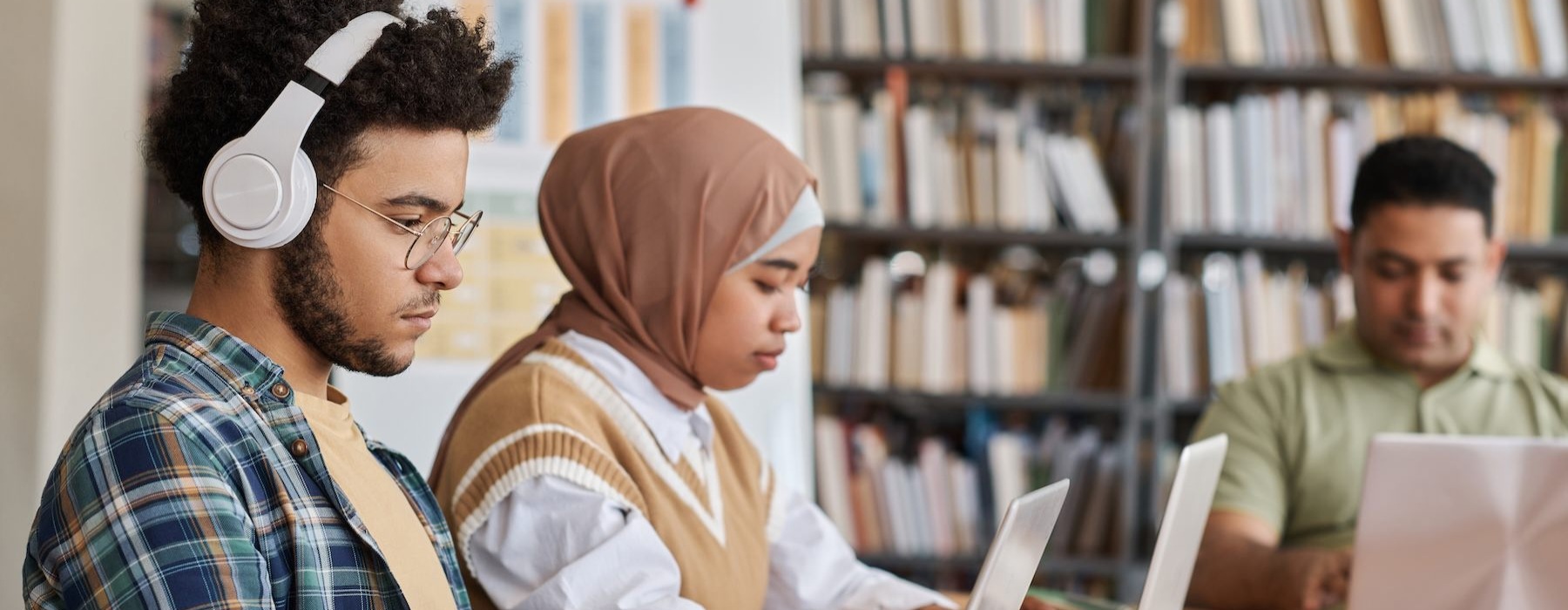 Settle into comfort at Altera Rayzor Ranch a group of people working on laptops